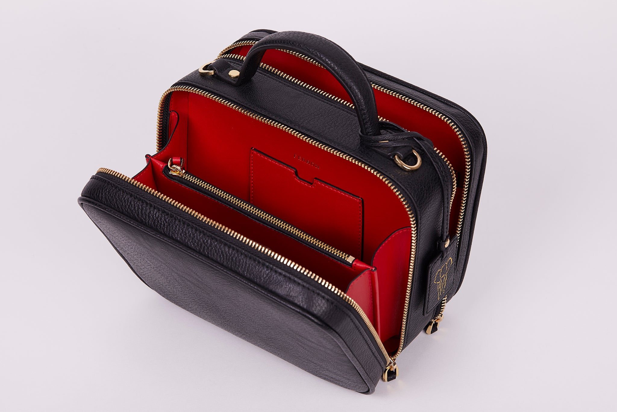 FERRON Vegan Signature Crossbody bag in black with luxurious red interior